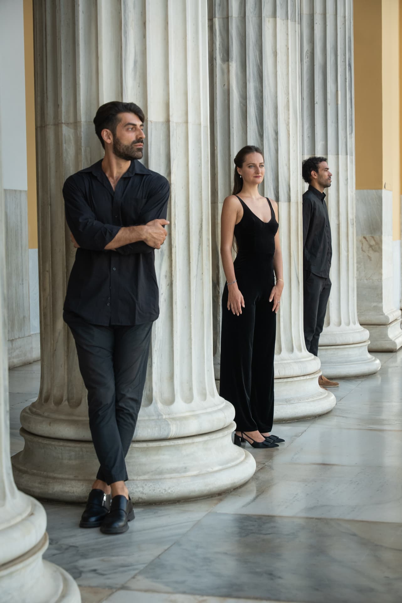 Ektoras Tartanis among marble columns